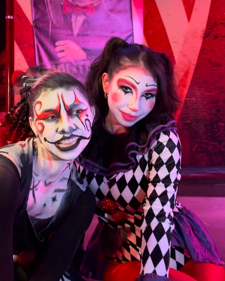 Howl-O-Scream style duo in theatrical clown makeup